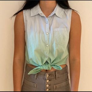 Sleeveless button down shirt.